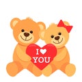 Funny characters are two teddy bears hugging and holding in their paws a big heart with the inscription I love you. The concept of Royalty Free Stock Photo