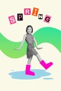 Funny charming school age little girl walking puddle wear pink cute gun boots shoes enjoy springtime day weather good Royalty Free Stock Photo