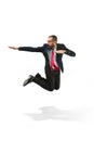 Funny cheerful businessman jumping in air over white background Royalty Free Stock Photo