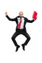 Funny cheerful businessman jumping in air over white background Royalty Free Stock Photo