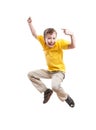 Funny cheerful child jumping and laughing pointing with his index finger