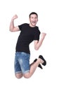 Funny cheerful happy man jumping in air over white background Royalty Free Stock Photo