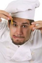 Funny chef cracking an egg Royalty Free Stock Photo