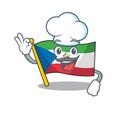 Funny Chef flag equatorial guinea Scroll cartoon character wearing white hat Royalty Free Stock Photo