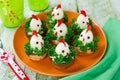Funny chickens from eggs on the Easter table Royalty Free Stock Photo