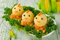 Funny chickens from eggs on the Easter table Royalty Free Stock Photo