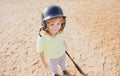 Funny child batter about to hit a pitch during a baseball game. Kid baseball ready to bat. Fun child face. Royalty Free Stock Photo