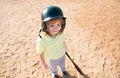 Funny child batter about to hit a pitch during a baseball game. Kid baseball ready to bat. Fun child face. Royalty Free Stock Photo