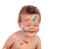 Funny child dirty with paint