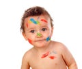 Funny child dirty with paint