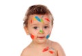 Funny child dirty with paint