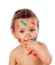 Funny child dirty with paint