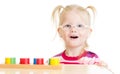 Funny child in eyeglases playing logical game