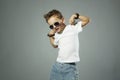 Funny child.fashionable little boy in sunglasses.emotion Royalty Free Stock Photo