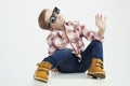 Funny child.fashionable little boy in sunglasses.stylish kid in yellow shoes Royalty Free Stock Photo