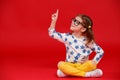 Funny child girl in glasses on colored background Royalty Free Stock Photo