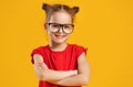 Funny child girl in glasses on colored background Royalty Free Stock Photo