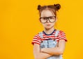 Funny child girl in glasses on colored background Royalty Free Stock Photo