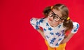 Funny child girl in glasses on colored background Royalty Free Stock Photo