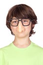 Funny child with glasses and nose joke