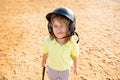 Funny child playing Baseball, winking. Batter in youth league getting a hit. Boy kid hitting a baseball. Royalty Free Stock Photo