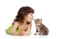 Funny child playing and kissing kitten Royalty Free Stock Photo