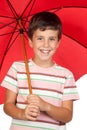 Funny child with a red umbrella Royalty Free Stock Photo