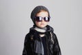 Funny child in scarf and hat.fashionable little boy in sunglasses Royalty Free Stock Photo