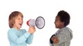 Funny child shouting through a megaphone to his friend Royalty Free Stock Photo