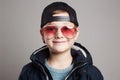 Funny child in sunglasses.smiling little boy Royalty Free Stock Photo