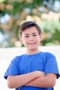 Funny child with ten years old with blue t-shirt