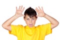 Funny child with yellow t-shirt mocking