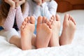 Funny children's foots is barefoot, closeup.