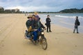 Funny Chinese fishermen on the motorcycle in Troy