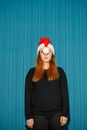 Funny christmas girl wearing a santa hat Royalty Free Stock Photo