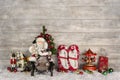 Funny christmas greeting card with santa and old children toys o Royalty Free Stock Photo