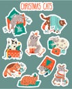 Funny Christmas and New Year cats stickers set. Cute cats with garland, giftboxes , sweaters. Collection of naughty pets for Royalty Free Stock Photo