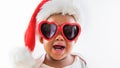 Funny portrait of naughty African American Baby wearing Sunglasses and Santa Hat Screaming Crying Royalty Free Stock Photo
