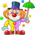 Funny clown holding an umbrella