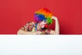 Funny clown with tie on blank board Royalty Free Stock Photo