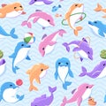 Funny color dolphins seamless pattern. Cartoon marine animals, toys and show accessories, trained underwater mammals Royalty Free Stock Photo