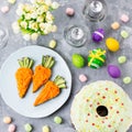 Funny colorful Easter food for kids with decorations on table. Easter dinner concept