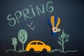 Funny composition on the theme of spring in a cartoon style, car , forest and a balloon Royalty Free Stock Photo