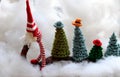 Funny concept for Winter holiday on dec 24, gnome transport Christmas tree