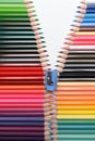Zip me down the arrangment of colored pencils similar to a zipper. Royalty Free Stock Photo