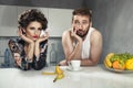 Funny couple after breakfast Royalty Free Stock Photo