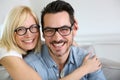 Funny couple at home with eyeglasses Royalty Free Stock Photo