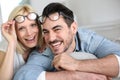 Funny couple removing eyeglasses Royalty Free Stock Photo