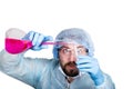 Funny crazy emotional chemist with flask. mad scientist in his laboratory experimenting on secret formulas. Royalty Free Stock Photo