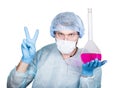 Funny crazy emotional chemist with flask. mad scientist in his laboratory experimenting on secret formulas. Royalty Free Stock Photo